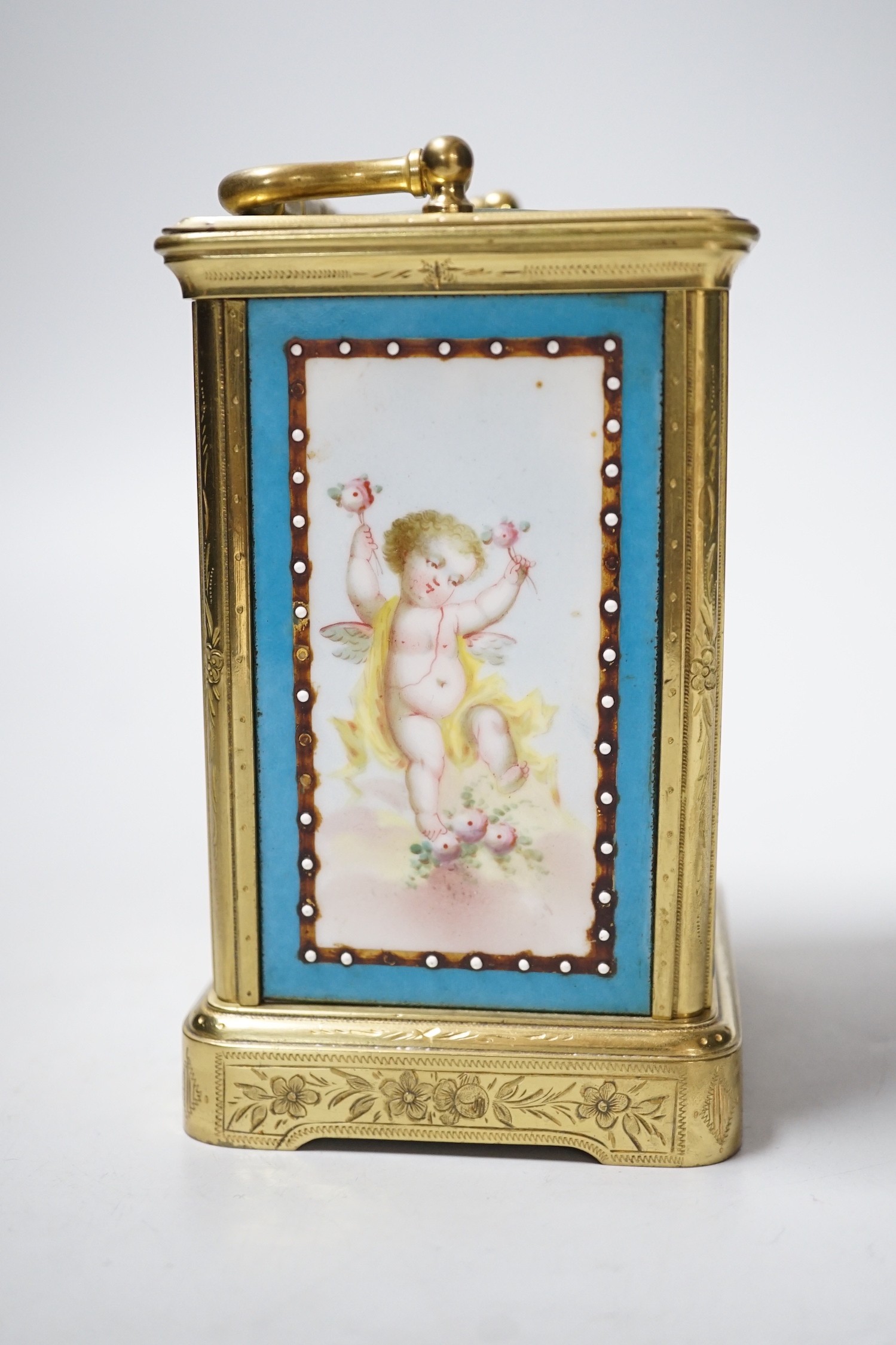 A 19th century engraved brass carriage clock by A Margaine, 14cm